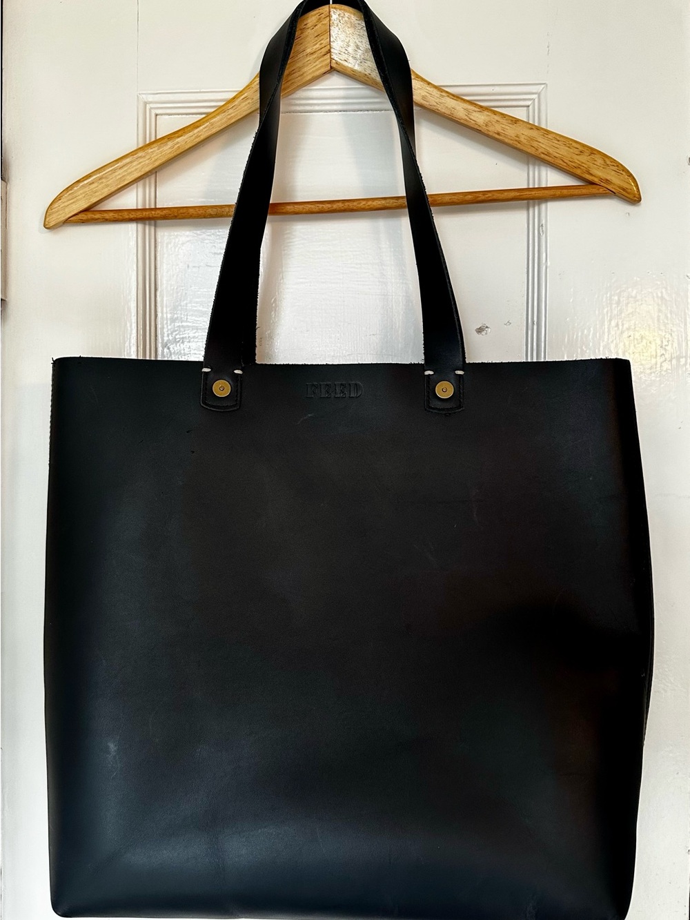 FEED 100 Black Leather Tote Bag with Brass Studs